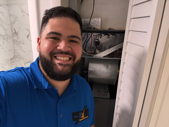 A home inspector examining an HVAC unit